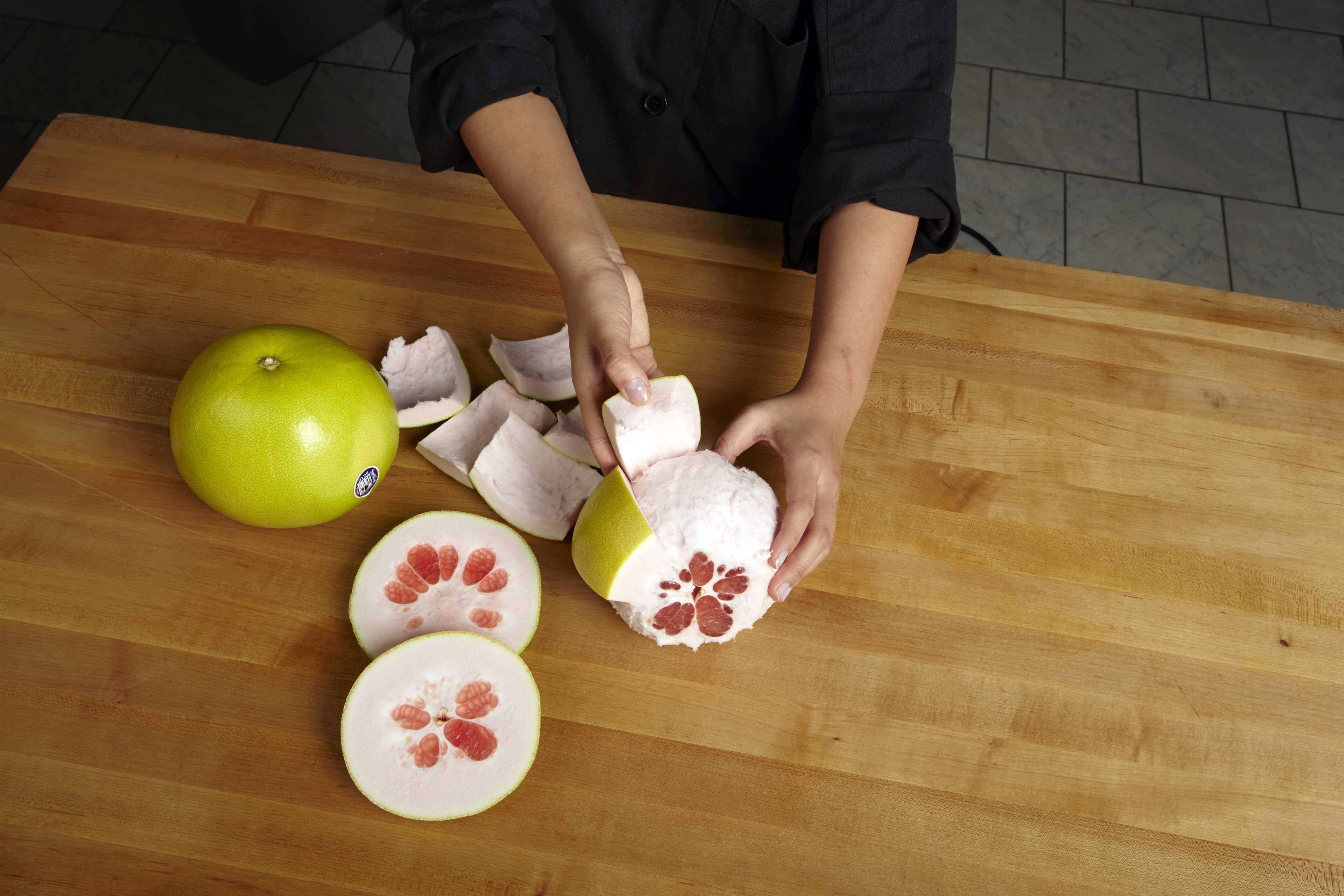 Opening a Pummelo Sunkist