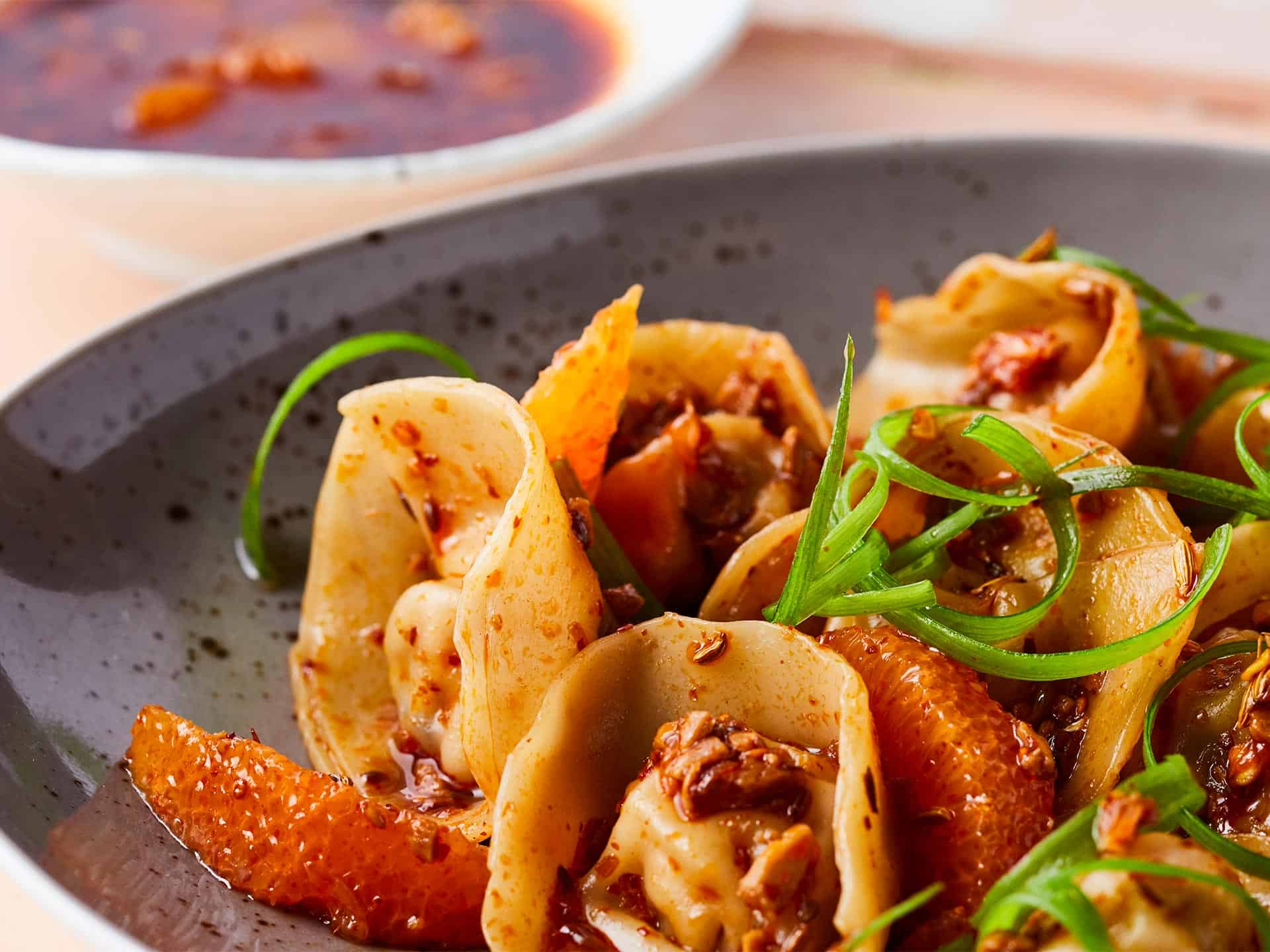 Pork Dumplings With Sichuan Citrus Sauce