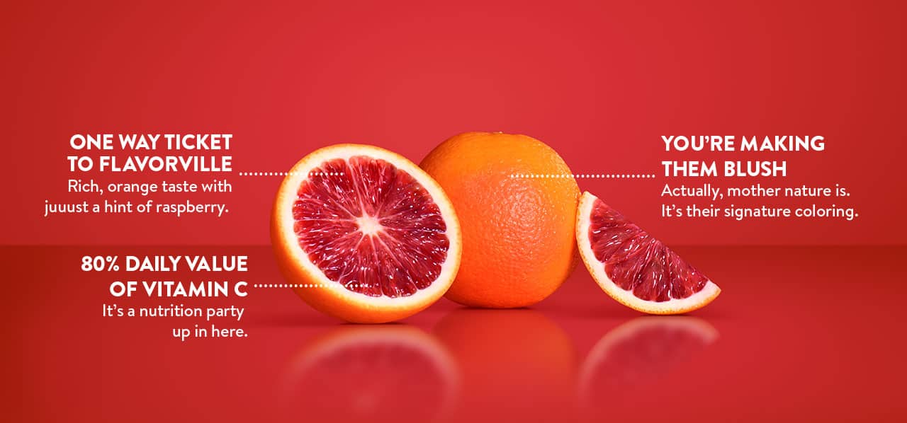 1 full blood orange, 1 half of a blood orange, and 1 blood orange wedge slice- on a red background and includes annotations
